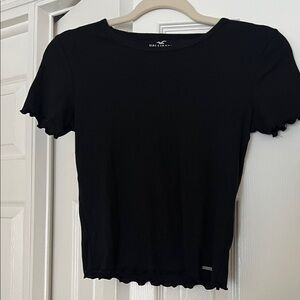 Hollister Black Short Sleeve ribbed Women's Tee can fit multiple sizes